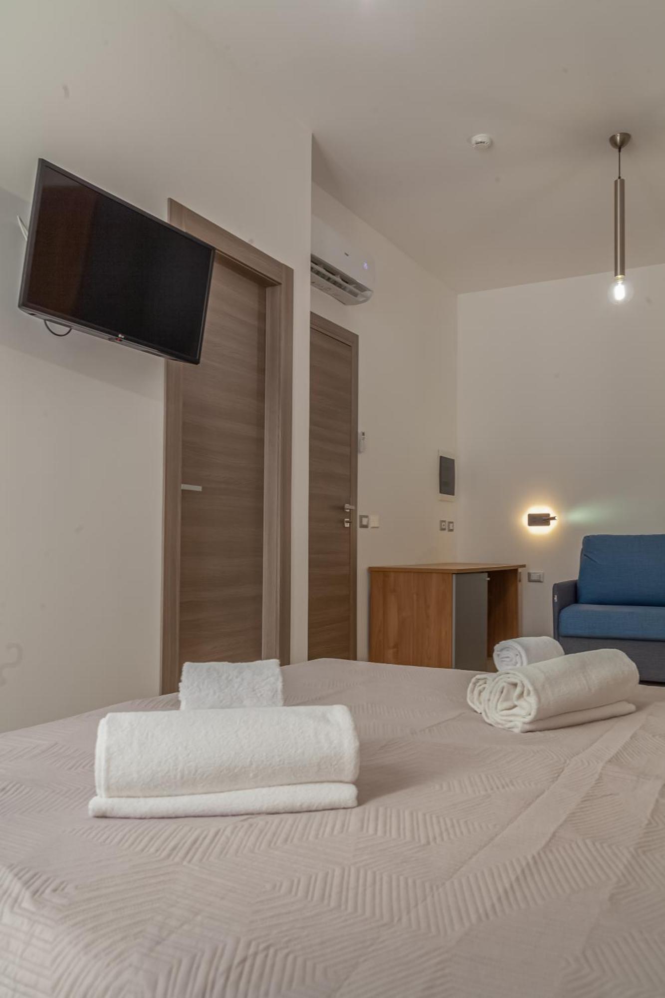 Quadruple Room with Private Bathroom